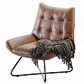 Brown Leather Single Sofa Diamond Tufted With Gray Fringed Blanket And Black Metal Legs