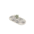 Elegant Tableware Set with White Lilies Glassware Cutlery on Oval Dining Table 3d model