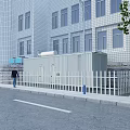 Outdoor Industrial Equipment With Blue Units Near White Building With Fence And Container Structure