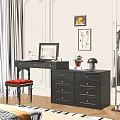 Elegant Black Dressing Table with Red Stool Framed Art Potted Plant and Mirror