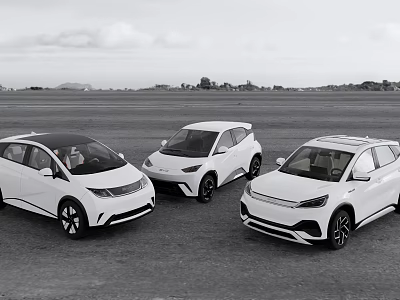 Three White Electric Vehicles Parked On Open Ground With Scenic Background 3d model