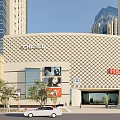 Modern Commercial Complex Featuring Geometric Facade Retail Shops Chatime H&M Street Entrance and Trees