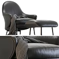 Modern Black Leather Lounge Chair With Ottoman And Cozy Throw Blanket