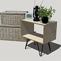Wooden Bedside Table With Black Metal Legs Photo Frame Lantern And Green Plant