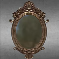 Ornate Oval Decorative Mirror With Carved Metal Frame And Grey Wall Background