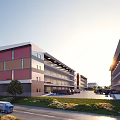 Industrial Factory Building Exterior With Red Brown Walls Lawn Trees And Truck On Road