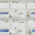Modern White Rectangular And Oval Bathtubs With Brass Faucets And Flower Petals
