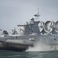 Military Hovercraft With Large Rotating Fans Radar System And Cannons On Water