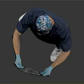 Man In Blue Medical Scrubs Holding X Ray With Gloves And Surgical Cap