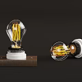 Vintage Filament Light Bulbs With Wooden Base Standing And Lying Design