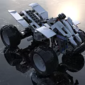 Electric Toy Monster Truck With Large Wheels And White Black Building Block Design