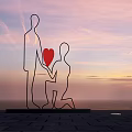 Silhouette Sculpture Featuring Kneeling Figure Holding Red Heart And Standing Person Against Sunset Sky Ocean