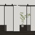 Modern Glass Barn Doors With Black Frames On White Walls And Wooden Floor