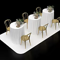 White Platform Setup With Round Tables White Tablecloths Decorative Flowers Pineapples And Gold Chairs