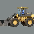 Yellow Heavy Duty Utility Loader Vehicle Operating On Sandy Terrain With Large Tires And Front Bucket