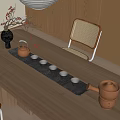 Natural Style Tea Set With Brown Teapot Cups Black Tray And Vase On Wooden Table