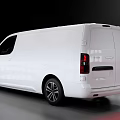 White Modern Van With Sleek Exterior Design And Black Alloy Wheels
