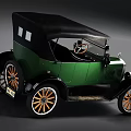 Vintage Green Ford Car With Black Top And Orange Spoked Wheels
