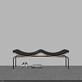 Black Wavy Seat Bench With Metal Legs Near Shoes And Books On Gray Carpet