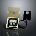 Clear Cover Connection Box Containing Blue Components With Black Square Device And Ring