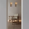 Minimalist Leisure Chair Featuring Wooden Frame Light Colored Cushion In Modern Room With Recessed Lighting