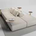Modern Beige Fabric Sectional Sofa With Cushions And Side Tables In Living Room