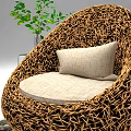 Woven Brown Round Leisure Chair with Light Colored Cushion Green Plant Transparent Vase and Magazines