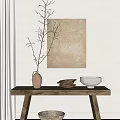 Minimalist Clay Vase with Twigs on Wooden Table with Wall Art and Natural Light