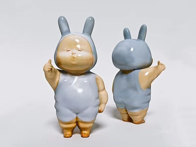 Decorative Rabbit Shaped Ornament Set Light Blue And Beige Ceramic Figurines With Gesture Details 3d model