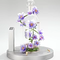 Elegant Floral Display with Purple Flowers in Glass Container on Modern Pedestal