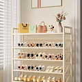 Living Room Featuring White Multi Shelved Shoe Rack With Handbags Decor Flower Vase And Neatly Arranged Shoes