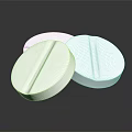 Three White Round Scored Tablets On Black Background With Reflection 3d model