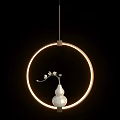 Warm Yellow Circular Pendant Light with White Vase and White Flowers against Black Background
