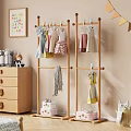 Wooden Storage Cabinet in Kids Room with Stuffed Toys Wooden Hanger and Alphabet Wall Decor