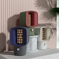 Colorful Modern Small Electric Appliances On Marble Base With Striped Wall And Green Plant