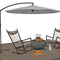Outdoor Chairs With Woven Design On Wooden Deck Featuring Umbrella And Fire Pit