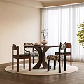 Round Wooden Table and Chair Set with Floral Cushions in Cozy Dining Space