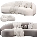 Modern Cream Sectional Sofa With Soft Throw Blanket And Round Decorative Pillows