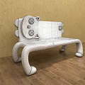 Cute Cartoon Cat Shaped Public Chair With Black Body Yellow Eyes And White Paws