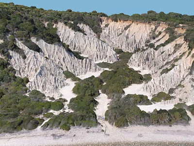 Scenic Natural Landscape Featuring Eroded Rock Formations Lush Green Vegetation And Layered Textures 3d model