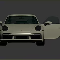 White Sports Car Featuring Sleek Aerodynamic Design And Black Alloy Wheels