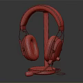 Black Over Ear Gaming Headphones With Comfortable Fit Green Accents Ergonomic Design On Stand