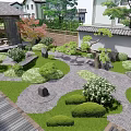 Traditional Japanese Courtyard Garden With Rock Formations Pruned Shrubs And Gravel Paths