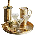 Champagne Bottle And Martini Glasses On Gold Tray With Ice Bucket Pitcher And Olives