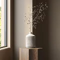 Elegant White Ribbed Vase With Decorative Branches On Wooden Round Table Near Window Natural Light Interior