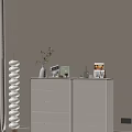 White Modern Dressers With Potted Plant Alarm Clock Photo Frame And Books