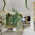 Modern Restaurant Interior With Curved Design Green Plants Gold Accents And Sculpture