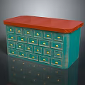 Blue Cabinet With Red Top And Multiple Drawers Featuring Gold Knobs