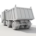 Green Dump Truck Functional Heavy Duty Vehicle Parked On Asphalt Road Surface
