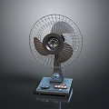 Classic Tabletop Electric Fan With Metal Grill And Control Buttons On Base